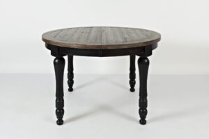 The Madison County Round to Oval Dining Table in Vintage Black in circle shape