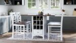 The Asbury Park Counter Drop Leaf Table with four chairs surrounding it, in a dining room environment