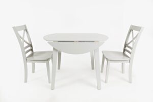 Simplicity Round Dropleaf Table- Paperwhite with two chairs next to it